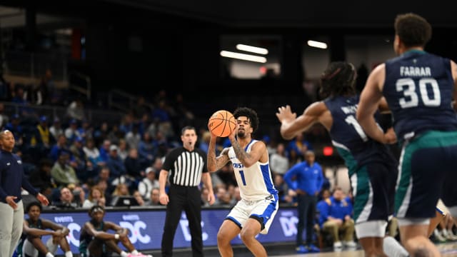 Mar 6, 2023; Washington, D.C., USA; Hofstra Pride guard Aaron Estrada (1) spots to to take a three point shot during the first half against the North Carolina-Wilmington Seahawks of CAA Tournament Semifinals at Entertainment & Sports Arena. Mandatory Credit: Tommy Gilligan-USA TODAY Sports